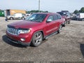 2012 Jeep Grand Cherokee — photo 2 of 16 | VIN 1C4RJFCG4CC315144
