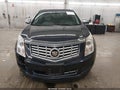 2016 Cadillac SRX — photo 13 of 17 | VIN 3GYFNEE35GS524110