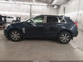 2016 Cadillac SRX — photo 15 of 17 | VIN 3GYFNEE35GS524110