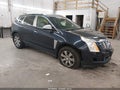 2016 Cadillac SRX — photo 1 of 17 | VIN 3GYFNEE35GS524110