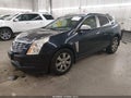 2016 Cadillac SRX — photo 2 of 17 | VIN 3GYFNEE35GS524110