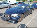 2014 Tesla Model S — photo 2 of 20 | VIN 5YJSA1H15EFP50981