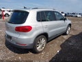 2012 Volkswagen Tiguan — photo 4 of 12 | VIN WVGAV7AX2CW589754