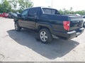 2011 Honda Ridgeline — photo 3 of 17 | VIN 5FPYK1F55BB010833