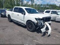 2018 Nissan Titan — photo 1 of 15 | VIN 1N6AA1E61JN525431