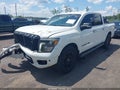 2018 Nissan Titan — photo 2 of 15 | VIN 1N6AA1E61JN525431