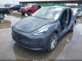 2023 Tesla Model Y — photo 2 of 18 | VIN 7SAYGDEE3PA184310