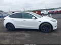 2025 Tesla Model Y — photo 12 of 15 | VIN 7SAYGDEE5SF291502