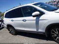 2022 Honda Pilot — photo 13 of 16 | VIN 5FNYF6H66NB067188