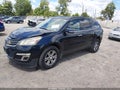 2016 Chevrolet Traverse — photo 2 of 16 | VIN 1GNKRHKD9GJ221699