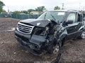 2014 Honda Pilot — photo 18 of 18 | VIN 5FNYF4H95EB041633