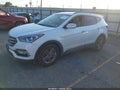 2017 Hyundai Santa Fe — photo 2 of 16 | VIN 5NMZU3LBXHH043198
