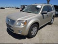 2011 Mercury Mariner — photo 2 of 12 | VIN 4M2CN8B77BKJ03117