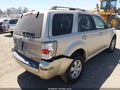 2011 Mercury Mariner — photo 4 of 12 | VIN 4M2CN8B77BKJ03117