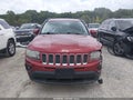 2014 Jeep Compass — photo 13 of 17 | VIN 1C4NJCEB8ED559844