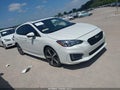 2017 Subaru Impreza — photo 1 of 16 | VIN 4S3GTAL63H3703310