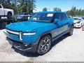 2023 Rivian R1T — photo 2 of 21 | VIN 7FCTGAAA0PN020360