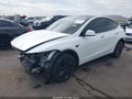 2026 Tesla Model Y — photo 2 of 18 | VIN 7SAYGDEE2TF538606