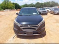 2016 Hyundai Tucson — photo 13 of 17 | VIN KM8J33A28GU222166