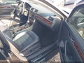 2013 Volkswagen Passat — photo 5 of 11 | VIN 1VWCN7A30DC040208