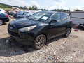 2014 Hyundai Tucson — photo 2 of 16 | VIN KM8JT3AF2EU847873