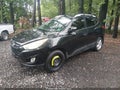2013 Hyundai Tucson — photo 2 of 11 | VIN KM8JU3AC6DU769793