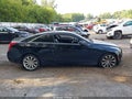 2016 Cadillac ATS — photo 13 of 16 | VIN 1G6AG1RXXG0102182
