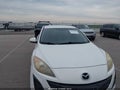 2011 Mazda 3 — photo 12 of 12 | VIN JM1BL1VG7B1455971