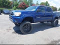 2015 Toyota Tacoma — photo 2 of 16 | VIN 5TFJX4GN8FX037905