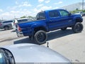 2015 Toyota Tacoma — photo 4 of 16 | VIN 5TFJX4GN8FX037905