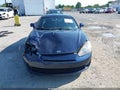 2008 Hyundai Tiburon — photo 12 of 16 | VIN KMHHN66F08U283941