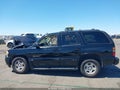 2004 GMC Yukon — photo 14 of 16 | VIN 1GKEK63U64J169199
