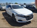2022 Honda Accord — photo 1 of 16 | VIN 1HGCV1F59NA034321