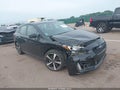 2019 Subaru Impreza — photo 1 of 16 | VIN 4S3GTAJ62K3762147