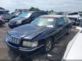 1999 Cadillac Deville — photo 2 of 11 | VIN 1G6KD54Y6XU729507