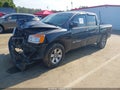 2009 Nissan Titan — photo 2 of 18 | VIN 1N6BA07D79N303031