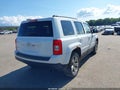 2014 Jeep Patriot — photo 4 of 17 | VIN 1C4NJRBB1ED879210