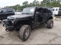 2009 Jeep Wrangler Unlimited — photo 6 of 19 | VIN 1J4GA59109L771794