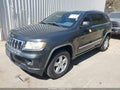 2011 Jeep Grand Cherokee — photo 2 of 14 | VIN 1J4RR4GG1BC697777