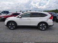 2015 Honda CR-V — photo 14 of 17 | VIN 5J6RM4H94FL004303
