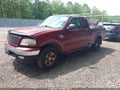 2003 Ford F-150 — photo 2 of 11 | VIN 1FTRX18L73NA83165