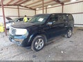 2015 Honda Pilot — photo 2 of 16 | VIN 5FNYF3H57FB012045