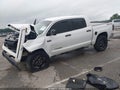 2015 Toyota Tundra — photo 2 of 17 | VIN 5TFDW5F19FX486952
