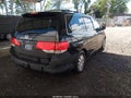 2009 Honda Odyssey — photo 4 of 18 | VIN 5FNRL38769B011309