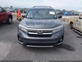 2020 Honda Pilot — photo 13 of 17 | VIN 5FNYF6H99LB043734
