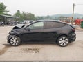 2021 Tesla Model Y — photo 13 of 15 | VIN 5YJYGDEE4MF196381