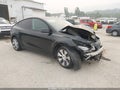 2021 Tesla Model Y — photo 1 of 15 | VIN 5YJYGDEE4MF196381