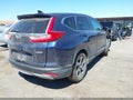 2017 Honda CR-V — photo 4 of 16 | VIN 5J6RW2H5XHL023341