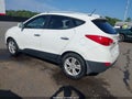 2012 Hyundai Tucson — photo 3 of 16 | VIN KM8JUCAC9CU471978