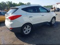 2012 Hyundai Tucson — photo 4 of 16 | VIN KM8JUCAC9CU471978